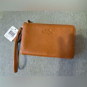 Coach wristlet with tags